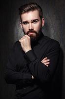 Portrait of stylish handsome man with a beard photo