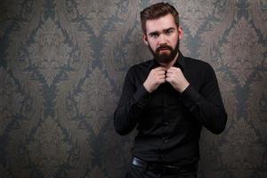 Portrait of stylish handsome man with a beard photo