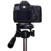 DSLR camera on tripod photo