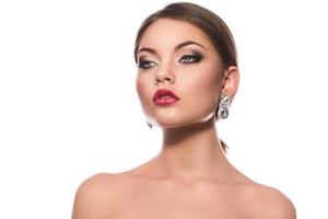 Portrait of gorgeous woman with luxury earrings photo