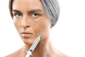 Young and old face comparison. Woman with syringe. photo