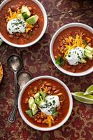 Traditional chili soup with meat and red beans photo