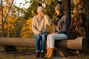 Young and happy couple in the autumn park photo