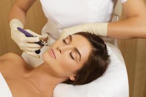 Woman in the beauty salon during Bio oxidation therapy photo