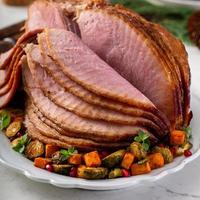 Christmas spiral ham with vegetables on the side photo