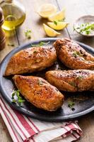 Roasted or seared chicken breast with herbs photo