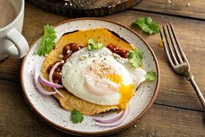 Baked beans with bacon on a toast photo