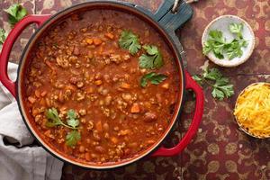 Traditional chili soup with meat and red beans photo