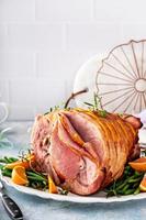 Traditional Easter ham with orange honey glaze photo