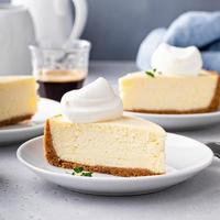 Classic New York cheesecake with a dollop of whipped cream