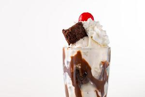 Chocolate ice cream sundae with whipped cream photo