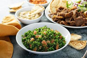 Parsley tabbouleh with tomato and cous cous photo