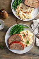 Meatloaf with mashed potatoes and green beans photo