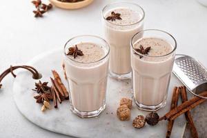 Chai in tall glasses with whole spices photo