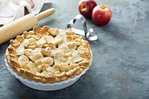 Apple pie topped with hearts photo