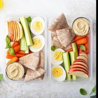 Healthy and nutricious lunch or snack boxes photo