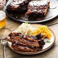 Barbeque meal with ribs and side dishes photo
