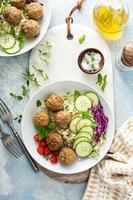 Healthy lunch bowl with meatballs and cauliflower rice