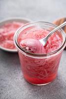 Marinated red onion in small jar