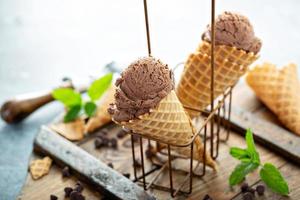 Chocolate mint ice cream in waffle cones photo
