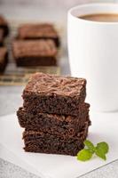 Stack of moist fudgy brownies photo