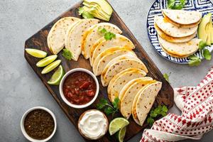 Baked tacos with pulled chicken and cheese photo