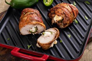 Jalapeno popper chicken wrapped in bacon and stuffed with jalapeno photo