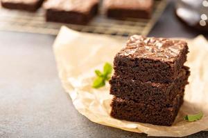 Stack of moist fudgy brownies photo