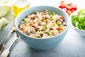 Rice with vegetables and beef photo