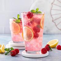 Spring or summer cold cocktail, raspberry lemonade photo