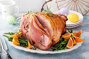 Traditional Easter ham with orange honey glaze photo