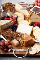 Cheese board with honey and crackers photo