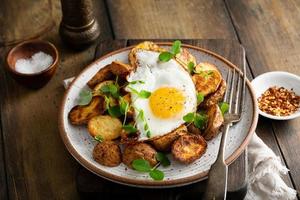 Air fried new potatoes topped with egg