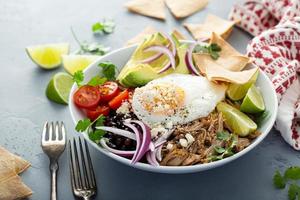 Breakfast burrito bowl with pork carnitas and rice photo