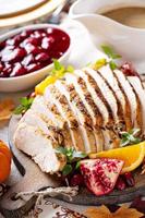 Sliced turkey on Thanksgiving or Christmas table photo