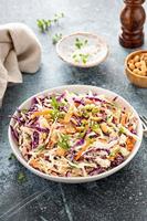 Asian cole slaw with peanuts and green onion photo