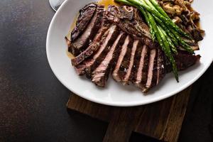 Beef steak with mushrooms and asparagus photo