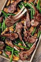 Grilled or roasted lamb chops with green beans and potatoes photo