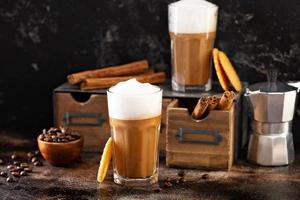 Coffee latte in small glasses photo