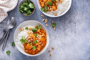 Vegan curry with cauliflower, chickpeas and butternut squash photo