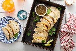 Baked tacos with pulled chicken and cheese photo