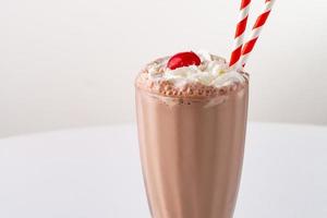 Chocolate milkshake with whipped cream photo