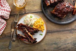 Barbeque meal with ribs and side dishes photo