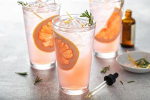 Grapefruit cocktail with rosemary with bitters photo