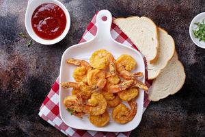 Southern fried shrimp with hot sauce photo