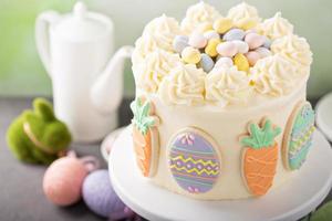 Easter cake with sugar cookies decor photo