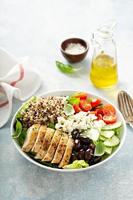 Greek inspired lunch bowl with chicken and quinoa photo