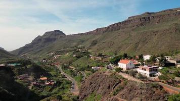 Aerial view of a town in a mountain region video