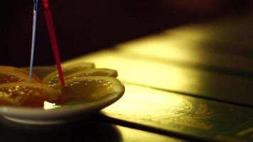 slices of lemon and orange on the table video