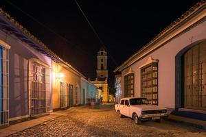 Trinidad, Cuba - Jan 12, 2017 -  Lada and Bell tower of the Convent of San Francisco de Asis in Trinidad, Cuba. photo